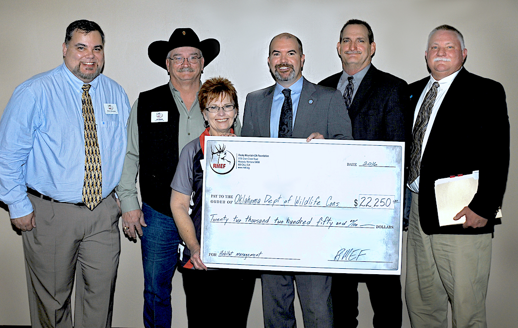Gathered to present a $22,250 donation from the Rocky Mountain Elk Foundation are, from left, RMEF Regional Director Shane Stenquist, RMEF Regional Chairman Jeff Steele, RMEF State Chairwoman Gayle Steele, Wildlife Department Director J.D. Strong, Assistant Chief of Wildlife Bill Dinkines and Chief of Wildlife Alan Peoples. (DON P. BROWN / ODWC)