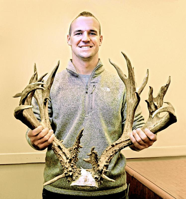 Jeffrey Parker of Moore holds the nontypical rack that scored 245 5/8, putting him in the second-place overall whitetail spot in the Cy Curtis Awards Program. (DON P. BROWN / ODWC)