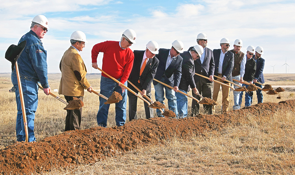 Supporters turn dirt during a groundbreaking ceremony for the Oklahoma Panhandle State University shooting sports complex. (MEGHAN GATES/OPSU)