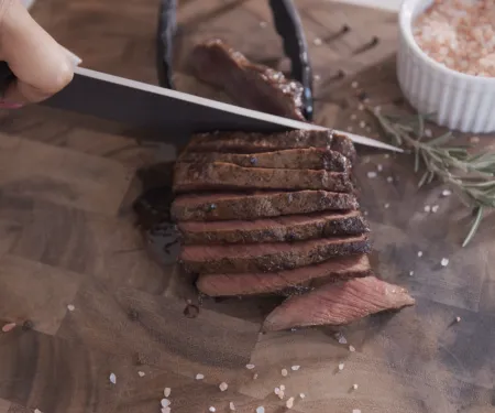 cutting deer meat photo