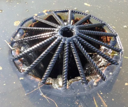 A photo of a fabricated standpipe cap made with 1/2" or 3/4" rebar.