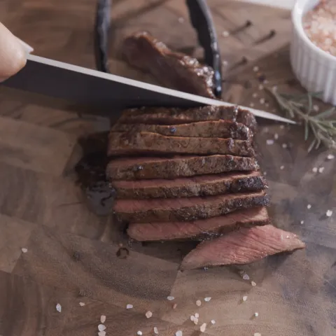 cutting deer meat photo