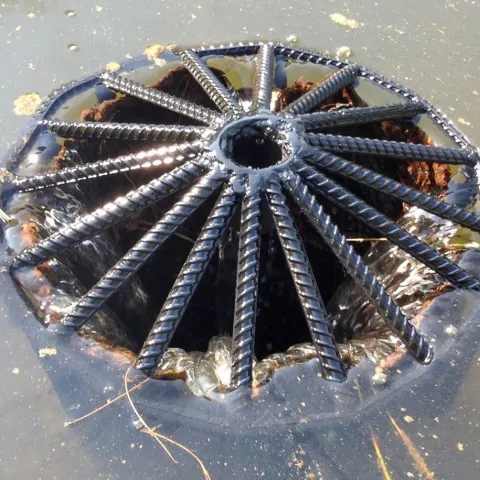 A photo of a fabricated standpipe cap made with 1/2" or 3/4" rebar.