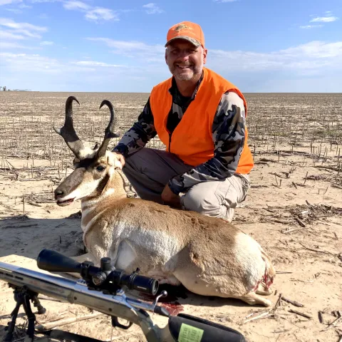 man with first antelope