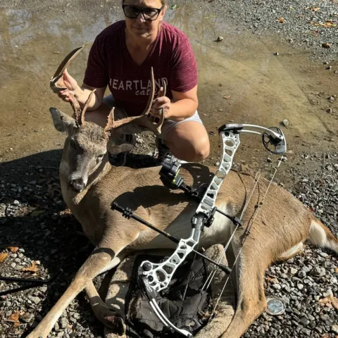 woman with archery buck