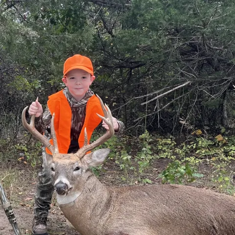 Cory Heckle with his harvested Oklahoma Whitetail deer.