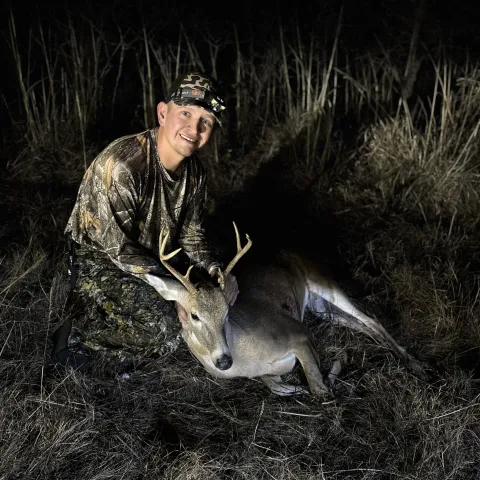 Rian Paige with his harvested Oklahoma White-Tailed Deer