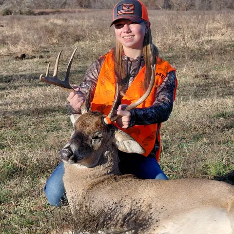 Hailey S with her harvested Oklahoma White-Tailed Deer