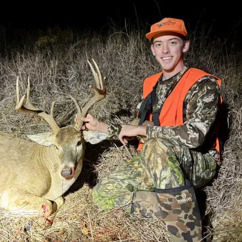 Coy Davidson with his harvested Oklahoma White-Tailed Deer