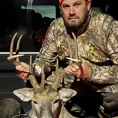 Ryan S with his harvested Oklahoma White-tailed Deer.