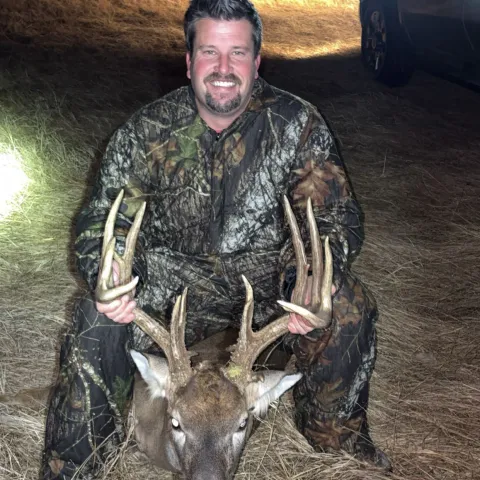 Brian S with his harvested Oklahoma White-tailed Deer.