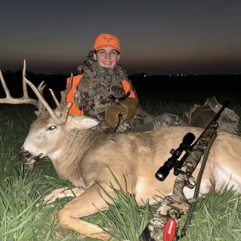Tate Homer with his harvested Oklahoma White-tailed Deer.