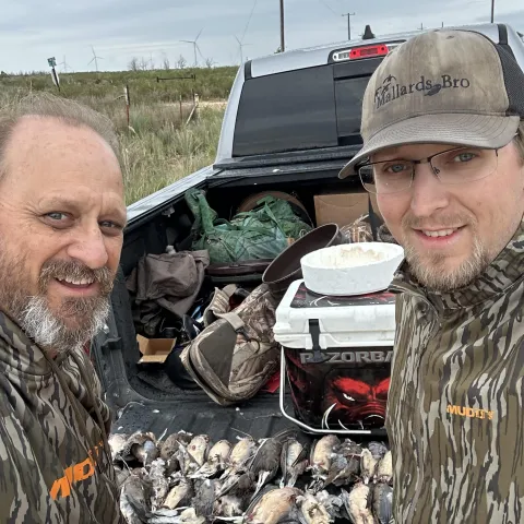 Joshua Luft with his harvested Oklahoma dove