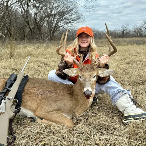 Campbell Moore with her harvested Oklahoma white-tailed deer