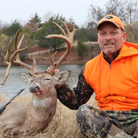 Brad Burchett with his harvested Oklahoma white-tailed deer