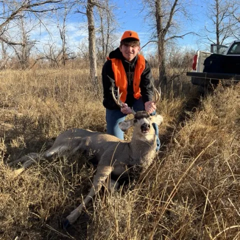 William May with his harvested Oklahoma mule deer