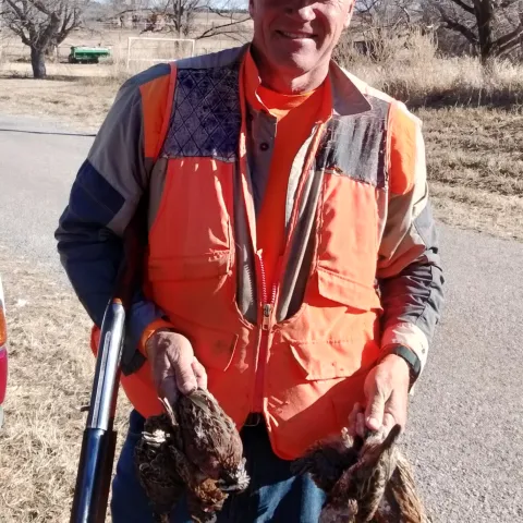 Kendall Johnson with his harvested Oklahoma quail