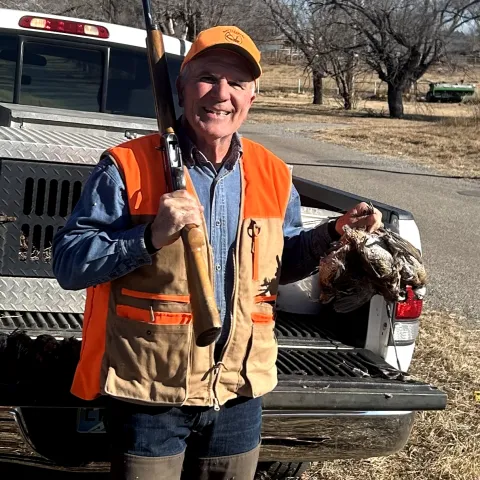 Earl Stephenson with his harvested Oklahoma quail