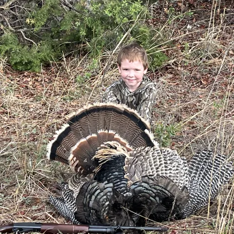 Cory Heckle with his harvested Oklahoma wild turkey
