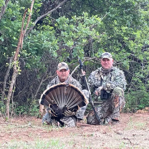 Doug French with his harvested Oklahoma wild turkey