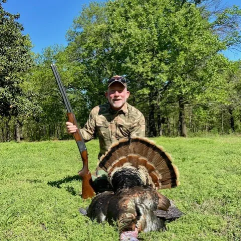 Perry Newman with his harvested Oklahoma Wild Turkey