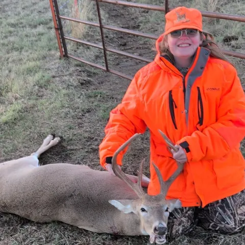 Orion Orr with his harvested Oklahoma White-tailed deer.