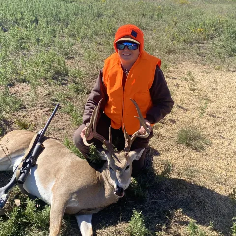 Holden Hartwick with his harvested Oklahoma White-tailed deer.