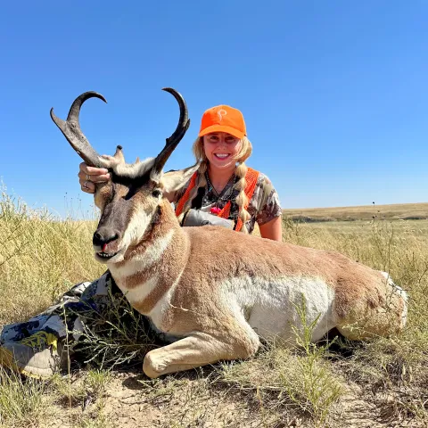 Pronghorn pictured with female hunter. 