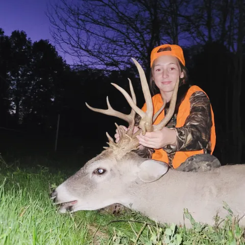 Tenley Sutton with her harvested buck 2023