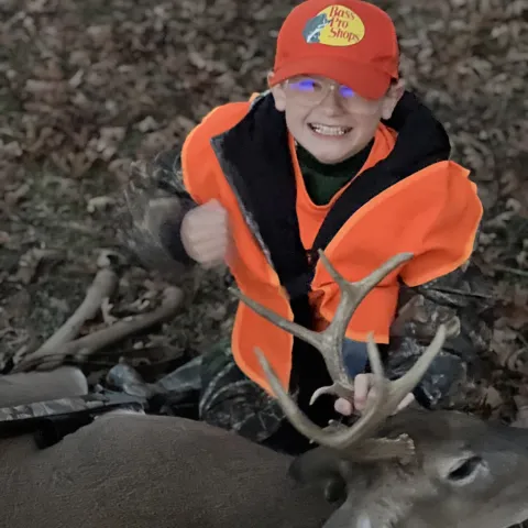Young happy hunter pictured with his first buck!
