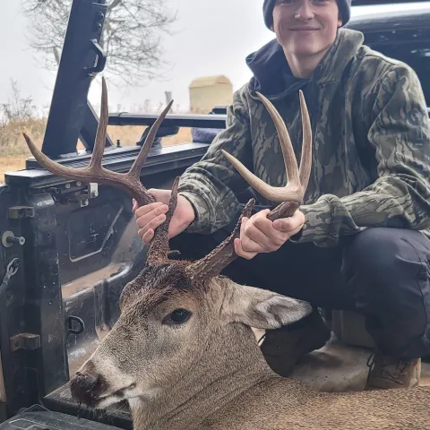 Young hunter's harvested deer.