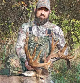 RIGHT: Darrell Boyd of Gerty harvested this giant nontypical buck during the 2016-17 archery season. The rack scored 204 1/8, which is eligible for listing in the Cy Curtis Awards, Boone & Crockett and Pope & Young registries. (PROVIDED BY DARRELL BOYD)