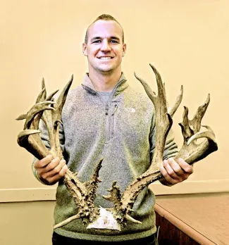Jeffrey Parker of Moore holds the nontypical rack that scored 245 5/8, putting him in the second-place overall whitetail spot in the Cy Curtis Awards Program. (DON P. BROWN / ODWC)