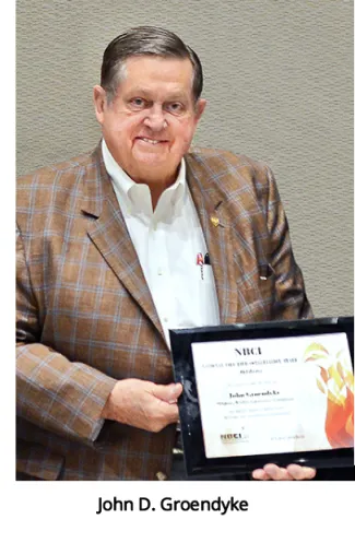John D. Groendyke with his Fire Bird Award