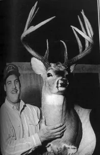 Chris Foutz with 179 6/8 scored deer harvested with a bow in Oklahoma County on December 23, 1992.
