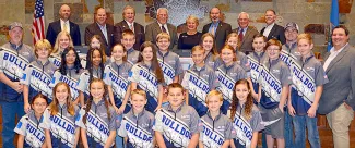 ODWC Commission and staff stand with the Altus Bulldogs archery team.