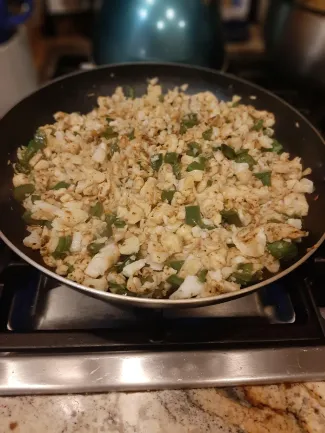 Crappie tacos in the pan cooking.