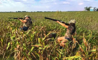Dove hunters take some shots at fast-flying birds in hopes of downing a few. Any state resident may hunt without a license during Oklahoma's Free Hunting Days on Sept. 3-4.