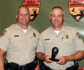 Law Enforcement Chief Col. Nathan Erdman with Game Warden Larry Green, recipient of the Colonel’s Life Saving Citation.