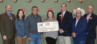 NWTF donates $42,700 to ODWC; from left are ODWC Director J.D. Strong, Oklahoma R3 Coordinator Kasie Harriet, NWTF Oklahoma Regional Director Oscar Juanes, NWTF Biologist Annie Farrell, ODWC Wildlife Chief Bill Dinkines, NWTF Board Member Rick Nolan, and ODWC Assistant Director Wade Free. 