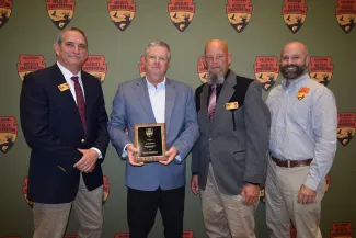 ODWC Wildlife Chief Bill Dinkines, left, Wildlife Biologist John Rempe, Wildlife Assistant Chief Scott Parry and NE Region Wildlife Supervisor Matt Mattioda.