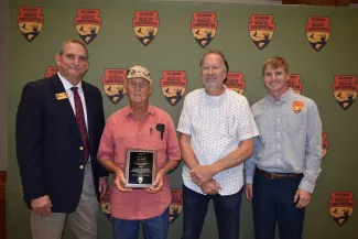 Wildlife Chief Bill Dinkines, left, 2025 ODWC Land Owner of the Year John Sanders, Alan Stacy from Ducks Unlimited, and Wildlife Biologist Paxton Smith.