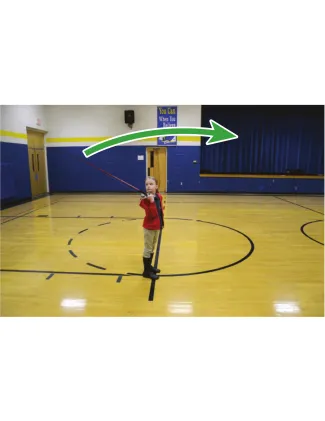 A girl holding a spincast rod/reel. 