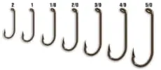 A photo of different fish hook sizes. 