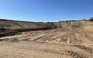 An update photo showing new berms at Canton WMA shooting range.