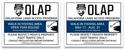 Two blue and white OLAP Walk-in Fishing Area signs. One is year-round and one is seasonal.