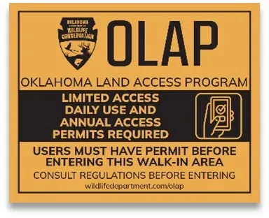 A black and yellow OLAP Limited Access sign.